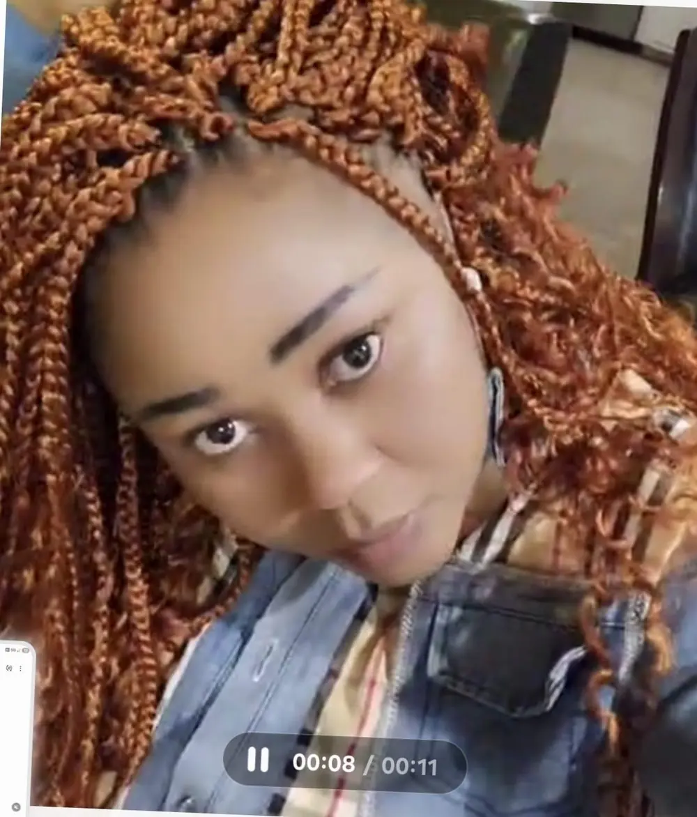 Warm copper braids with a curly finish by Empress Royal Braids & Beauty