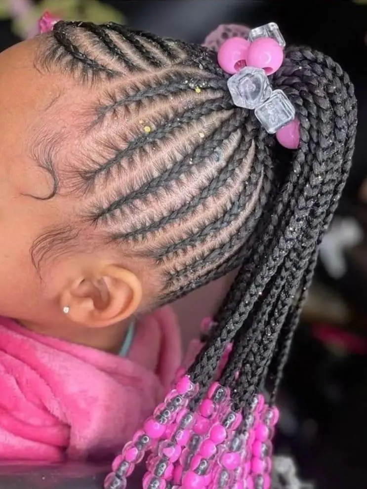 Kids beaded braid style with pink and clear beads by Empress Royal Braids & Beauty
